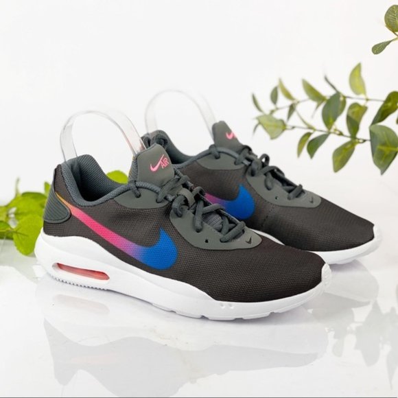 white nike shoes with rainbow swoosh